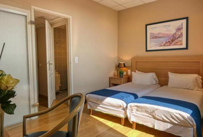 Cit'Hotel Le Louvre Orange الغرفة الصورة