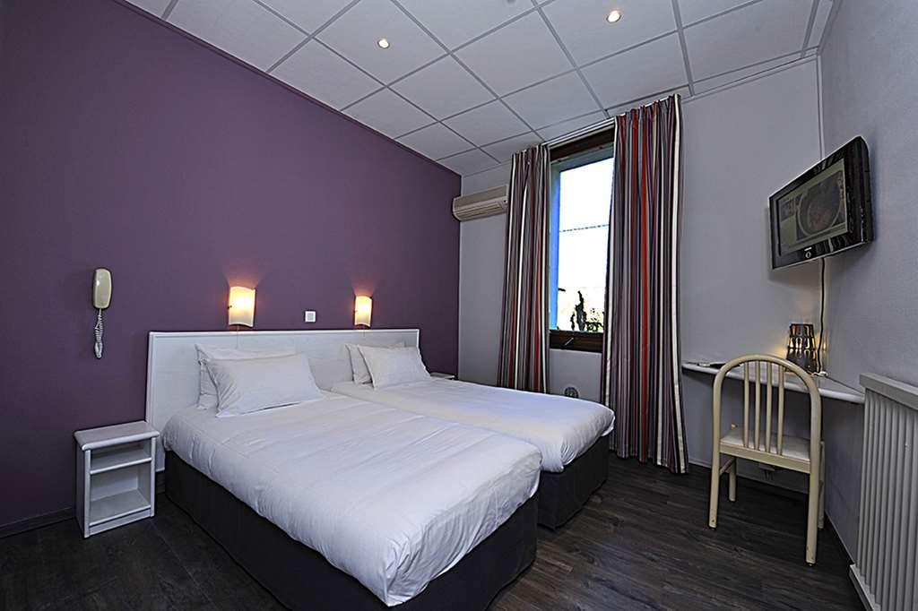 Cit'Hotel Le Louvre Orange الغرفة الصورة