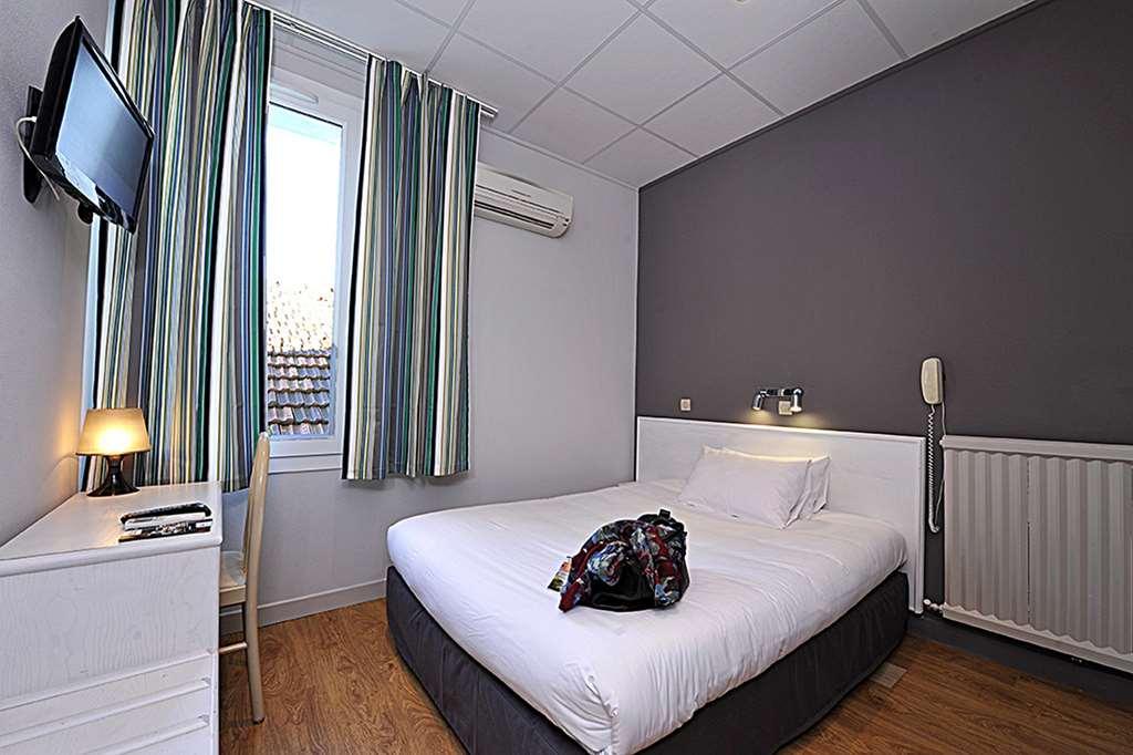 Cit'Hotel Le Louvre Orange الغرفة الصورة